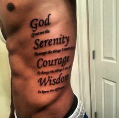 a man's stomach with the words god, serenity and courage on it