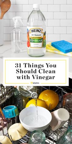 a dishwasher with the words 31 things you should clean with vinegar