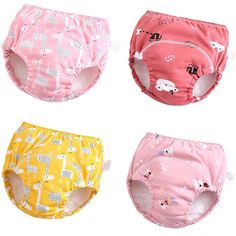 three pairs of diapers with animals on them