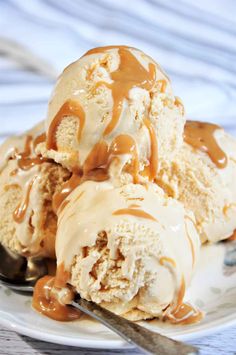 two scoops of ice cream with caramel drizzle on top