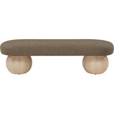 an upholstered bench with two wooden balls on the bottom and one in front