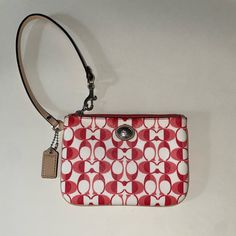 Never Used Pink/White Coach Wristlet White Coach Clutch With Zipper Pouch, White Rectangular Coach Clutch, White Clutch Wristlet With Wrist Strap, White Wristlet Clutch With Wrist Strap, White Handheld Clutch As Fashion Accessory, Trendy White Wristlet, Coach White Rectangular Wristlet, White Coach Pouch Wristlet, White Coach Clutch For Everyday