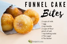 a bunch of doughnuts sitting on top of a paper bag with the words funnel cake bites