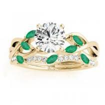 a diamond and emerald bridal set with leaves on the band, in 18k rose gold