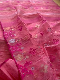 🌸 Hey everyone! 🌸 I am absolutely thrilled to share with you all the sheer elegance and beauty of original hand woven Dhakai Jamdani sarees! This saree includes * Pink, Silver and golden shiny tassel * Fall and piku done * Count: 80 and 60 count combinations * Half silk * Blouse piece included (Product colour may slightly vary due to photographic lighting sources or your monitor settings) Jamdani sarees are a true masterpiece of art, originating from the heartland of Bangladesh. Each thread is Dhakai Jamdani Saree Silk, Dhakai Jamdani Saree Cotton, Bangladeshi Jamdani Saree, Purple Jamdani Saree, Dhakai Jamdani Saree, Copper And Pink, Jamdani Saree, Pink Colour, Saree Look