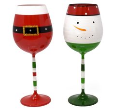 two wine glasses decorated to look like santa and snowman