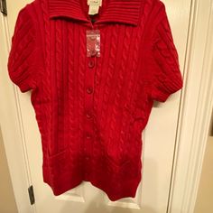 Nwot Ll Bean Short Sleeve Button Down Sweater With Pockets On The Front. Brand New, Never Worn, Will Ship In Original Packaging. Heavy 100% Cotton. Extra Button Attached. Super Cute For Fall. No Stains, Smells Or Rips. Comes From A Smoke- Free, Pet Hair-Free Home. Ships Out Quickly. I Have 3 Of These Sweaters In Different Colors. Will Bundle At A Discount. Measurements As Follows: Pit To Pit: 19” Length: 25” Hip: 19” Arm: 7.5” Feel Free To Ask Questions Before Purchasing. Red Workwear Sweater With Button Closure, Red Winter Tops With Button Closure, Winter Short Sleeve Tops With Buttons, Winter Tops With Buttons And Short Sleeves, Short Sleeve Sweater With Buttons For Fall, Fall Short Sleeve Button Sweater, Short Sleeve Button Sweater For Fall, Casual Red Sweater With Buttons, Red Buttoned Sweater For Work