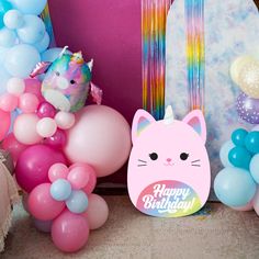 a birthday party with balloons and decorations