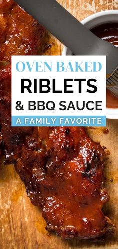 ribs and bbq sauce on a cutting board with the words oven baked ribbers and bbq sauce