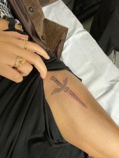 Swords With Wings Tattoo, Knife With Wings Tattoo, Tatoos Wings, Dagger With Wings Tattoo, Cross Swords Tattoo Design, Small Dagger Tattoo Simple, Dagger Tattoo Men, Dagger Leg Tattoo, Dagger Sternum Tattoo Women