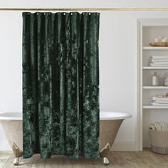 a bath room with a tub and a curtain