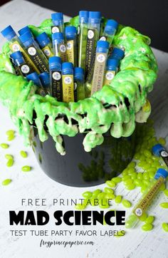 a bucket filled with green liquid and sprinkles sitting on top of a table