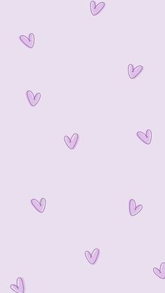 purple hearts on a pink background