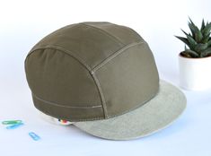 "A military green and plushy gray strapback hat, made from cotton, with a classical 5 panel crown and a unique medium length brim. Carefully crafted in Romania. Pedal like a madafaca while proudly wearing it. Ride fast through traffic, exercise your body and calm your mind ~ it's also what we believe in. You can never have enough caps, it's a fact. You can color match them with your clothes, with your eyes or with your bike. They make you look good, they protect you from the sun, rain or cold, t 5 Panel Hat, Calm Your Mind, Strapback Hats, Just The Way, Military Green, Trucker Cap, One Pic, Believe In You, Medium Length