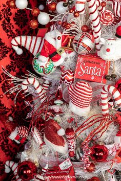 a christmas tree decorated with candy canes and ornaments