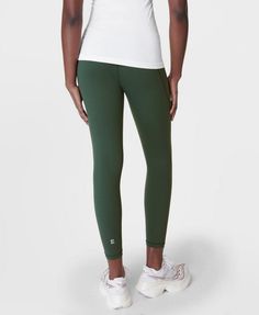 Our stretchy, multi-sport gym leggings designed for every workout. Stretchy fabric with flattering seams to sculpt the bum. Sweat-wicking, quick-drying and breathable. Side pocket and back zip pocket. Internal adjustable drawcord. Inseam length: 24" / 60cm. Model wears size S and is 178cm/5'10" tall. Style Code: SB5400 78Colour: Trek Green Snowboarding Accessories, Sport Gym, Gym Leggings, Leggings Design, Short Jumpsuit, Swimwear Collection, Dress Trousers, Leggings Shop, Tops For Leggings