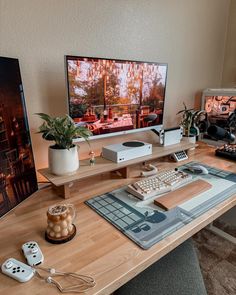 a computer desk with two monitors, keyboard and mouse sitting on it's side