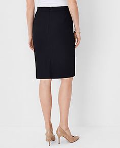 Elevate your wardrobe with the Ann Taylor Seamed Pencil Skirt in Bi-Stretch, tailored specifically for a curvy fit. This skirt is a testament to sophisticated styling and perfect tailoring, designed to enhance your silhouette.

- **Size**: 2 (Regular, Curvy Fit)
- **Color**: Classic Black
- **Material**: 66% Polyester, 28% Rayon, 6% Spandex
- **Length**: 21 1/2 inches long
- **Features**: Hidden back zipper with hook-and-eye closure, back vent, fully lined
- **Care**: Machine washable

Ideal for Elegant Office Skirt With Side Zipper, Fitted Workwear Skirt With Side Zipper, Workwear Stretch Skirt With Side Zipper, Workwear Skirt With Side Zipper And Stretch, Fitted Knee-length Bottoms With Side Zipper, Elegant Pencil Skirt With Side Zipper, Stretch Skirt With Side Zipper For Work, Fitted Pencil Skirt With Side Zipper For Office, Elegant Knee-length Bottoms With Side Zipper