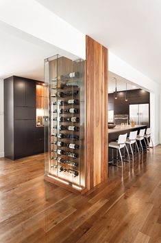 a wine rack in the middle of a room