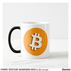 a white and black coffee mug with a bitcoin on it