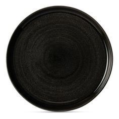 an empty black plate on a white background