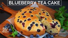 a blueberry tea cake on a cutting board