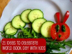 a white plate topped with cucumbers and carrots