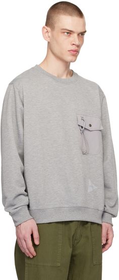 French terry sweatshirt. · Rib knit crewneck, hem, and cuffs · Taffeta flap pocket at chest · Detachable carabiner strap at pocket · Reflective logo printed at front Part of the and wander x Gramicci collaboration. Supplier color: Grey Urban Crew Neck Sweatshirt With Side Pockets, Crew Sweatshirt With Pockets For Streetwear, Streetwear Crew Sweatshirt With Side Pockets, Crew Neck Sweatshirt With Side Pockets For Streetwear, Techwear Crew Neck Sweatshirt With Pockets, Cotton Long Sleeve Sweatshirt With Cargo Pockets, Cotton Sweatshirt With Pockets For Outdoor Activities, Outdoor Cotton Sweatshirt With Pockets, Knit Crewneck