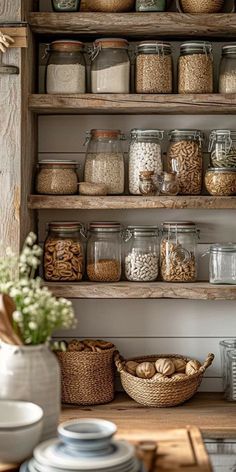 the shelves are filled with various types of cereals and other foods in glass jars