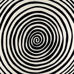 an abstract black and white pattern with spirals in the center, as if it were optical art