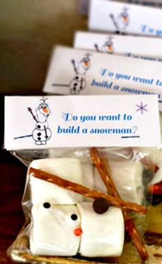 marshmallows are wrapped in cellophane to look like snowmen