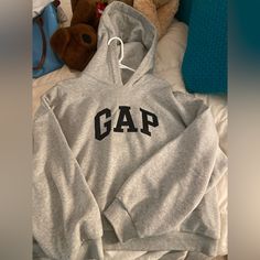 Brand New Soft Gray Gap Hoodie Gap Hoodie Sweatshirt With Adjustable Hood, Gap Casual Hoodie With Adjustable Hood, Gap Sweatshirt With Adjustable Hood For Fall, Gap Casual Sweatshirt With Adjustable Hood, Casual Gap Hooded Hoodie, Casual Gap Hoodie For Fall, Casual Hooded Gap Hoodie, Gap Casual Hoodie For Spring, Gap Casual Hoodie For Streetwear