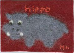 a needled hippo on a red background with the word hippop in it