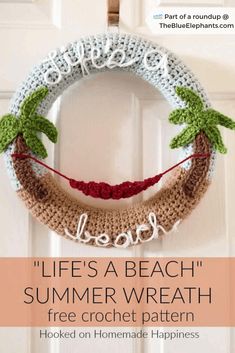 a crocheted wreath with the words life's a beach on it