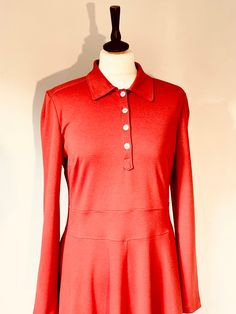 The dress is made of a terracotta orange Milano jersey material (stretch material). The dress has a skater cut with a polo collar and has small shell buttons on the front. There are pockets in the side seams. Dress length: 116 cm Size: M ( fr Size: 40) Care of clothing: Wash 30oC - Regular iron - Dry cleaning https://vlbasics.etsy.com Knit Polo Dress, Orange Knit, Knit Polo, Cotton Midi Dress, Shell Buttons, Polo Dress, Polo Collar, Dress Clothes For Women, Dress Length