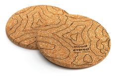 two wooden coasters with the words mount everest printed on them