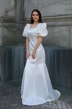 Bridal gown with square neckline and puff sleeves and pearls by caelinyc Modest Formal Wear, Wedding Dresses Nyc, Catholic Fashion, Modest Evening Gowns, Modesty Matters, Modest Bride, Modest Formal Dresses, Modest Bridal Gowns, Modest Bridal