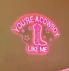 a neon sign that says you're cowboy like me