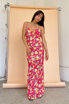 Bright pink floral maxi dress Self: 100% polyester Lining: 100% polyester Large floral print V-cut in front and back Back tie detail Lined until mini length Small measures 45.5” long Runs true to size Sher is 5’3. Waist: 24" Bust: 30B Wearing size Extra Small. Pink Floral Print V-neck Maxi Dress, Pink Tropical Print V-neck Maxi Dress, Pink V-neck Maxi Dress With Tropical Print, Summer Floral Print Pink Maxi Dress, Pink Tropical Print Maxi Dress, Summer Pink Printed Maxi Dress, Pink Floral Print Maxi Dress For Summer, Pink V-neck Maxi Dress With Rose Print, Pink Chiffon Maxi Dress For Brunch