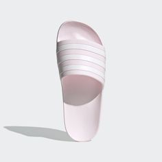 adidas Adilette Aqua Slides - Pink | Women's Swim | adidas US Adidas Synthetic Slides For Swimming, Adidas Slides For Swimming, Adidas Sporty Slip-resistant Slides, Adidas Slides For Swimming With Logo, Adidas Slides With Logo For Swimming, Adidas Slides For Swimming With Synthetic Material, Adidas Logo Synthetic Slides For Swimming, Adidas Sporty Synthetic Flip Flops, Sporty Adidas Synthetic Flip Flops