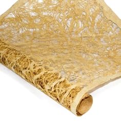 an image of a roll of straw on the floor with no sheets or coverings