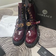 Never Worn. Box, Dust Bag, And Tags Included Luxury Women's Combat Boots With Front Lace-up, Luxury Lace-up Combat Boots With Leather Footbed, Leather Combat Boots Women, Purple Versace Heels, Versace Couture Bag, Versace Boots, Versace Purple Bag, Black Leather Combat Boots, Bordeaux Color