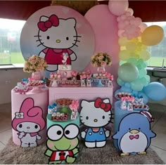 a hello kitty themed birthday party with balloons