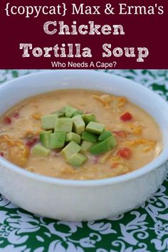 a white bowl filled with tortilla soup and topped with sliced avocado