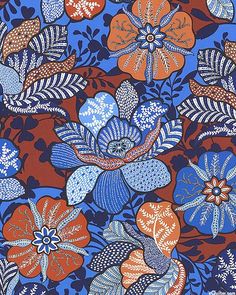 a blue and red floral pattern with many different flowers on it's sides, including leaves