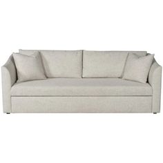 a white couch with pillows on it