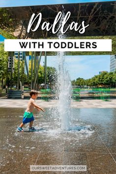 a young boy playing in a fountain with text overlay that reads, dallas with toddlers