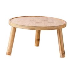 a small wooden table sitting on top of a white floor