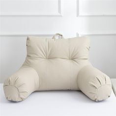 an inflatable pillow sitting on top of a white table