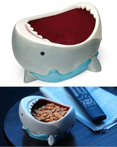 a whale shaped bowl filled with fish food